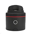 Matte black PIVO face tracking camera mounted on a surface with a smartphone attached.