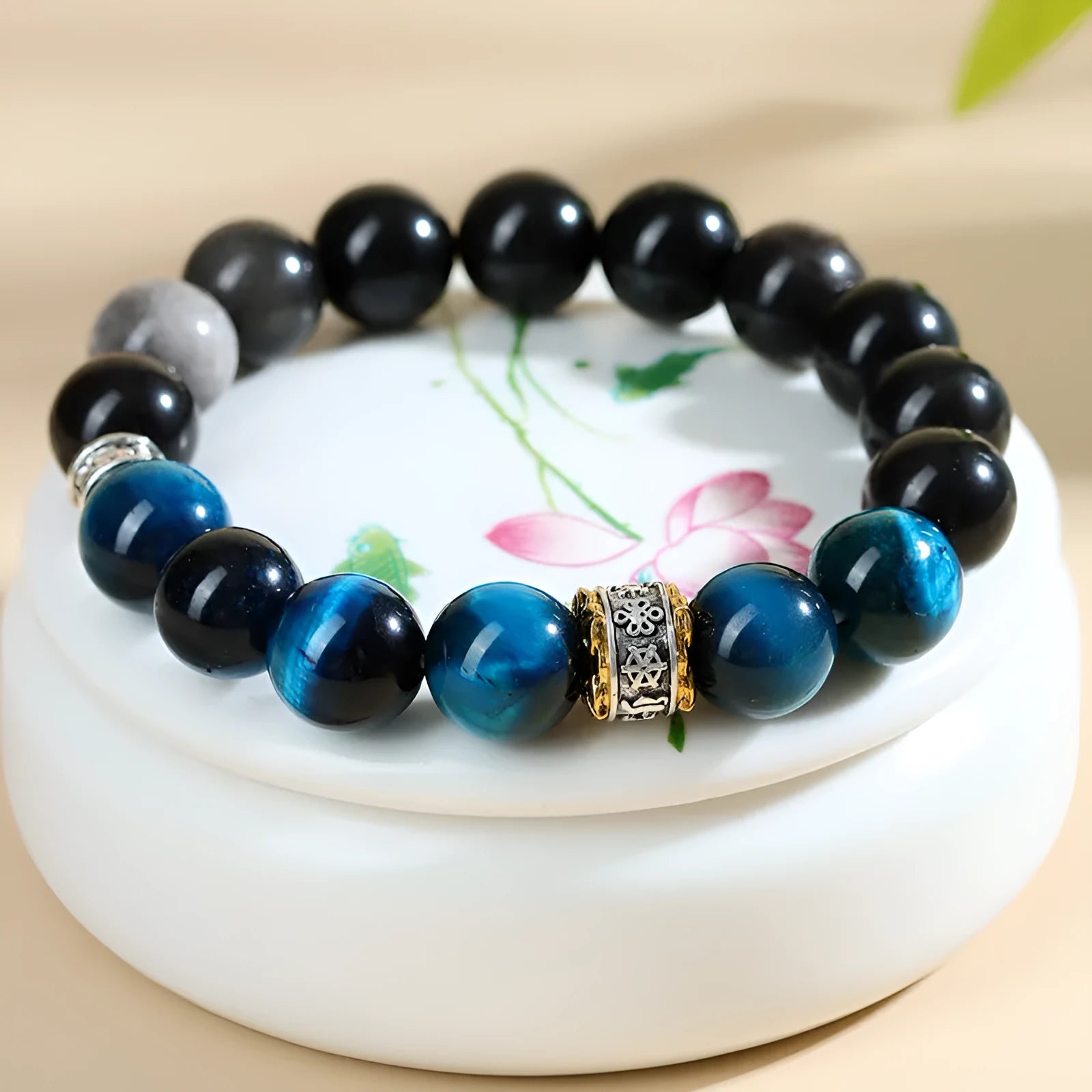 Handmade peacock blue tigereye stone bracelet with geometric ethnic design and adjustable silver fastening