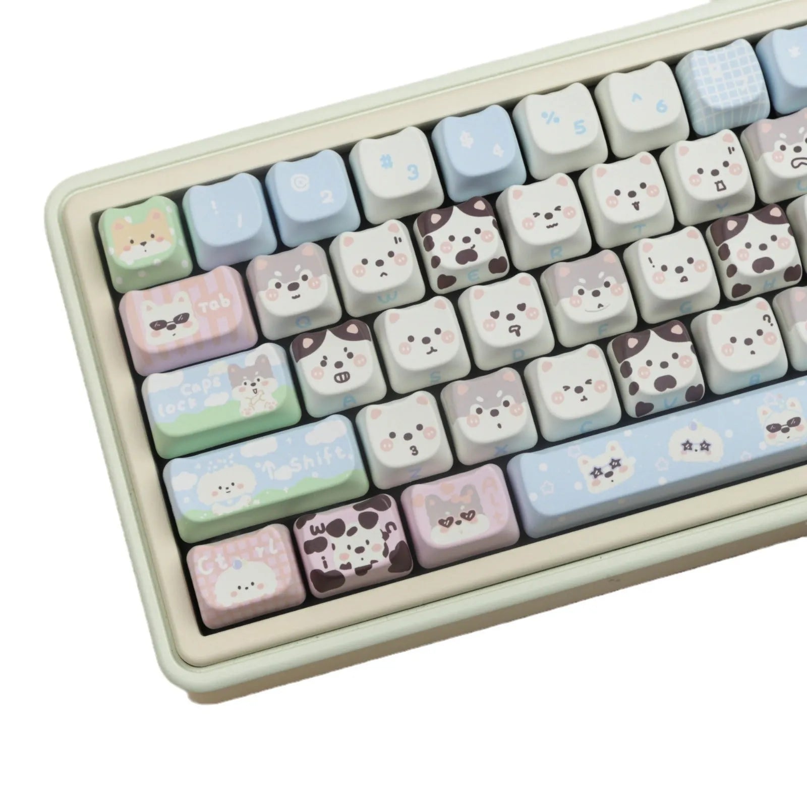 Full set of colourful PBT keyboard keycaps with sublimated cute puppy and cat designs laid out.