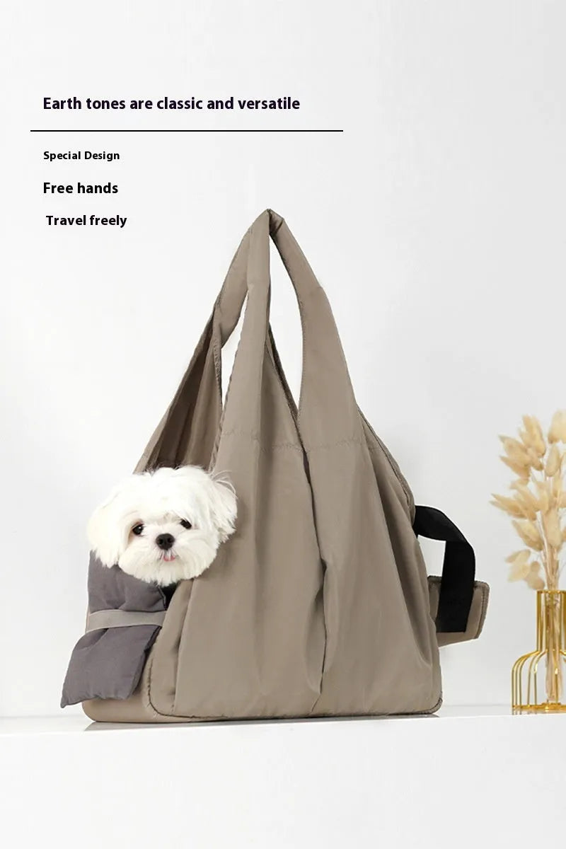 Apricot coloured cloth pet handbag with dimensions 41cm by 16cm by 28cm
