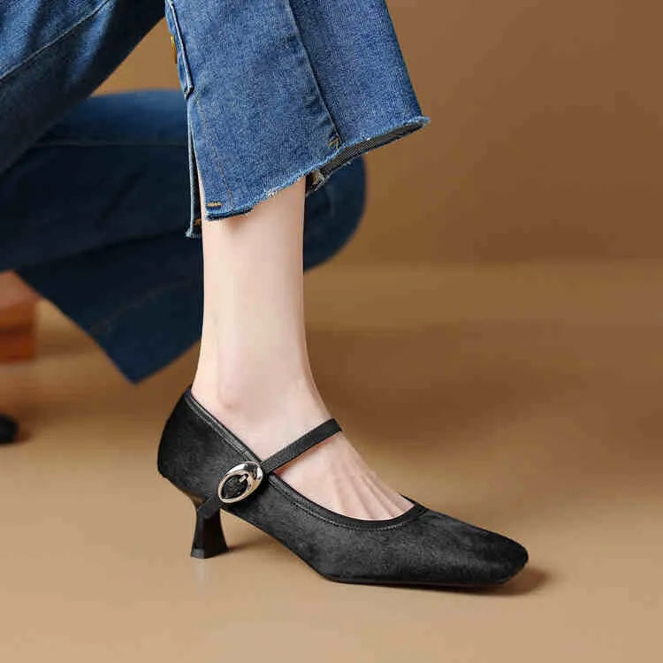 Black square toe stiletto ankle-strap heels with horse hair upper and buckle closure