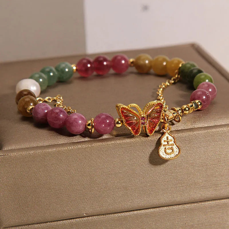 Natural jade coloured agate bracelet with butterfly-gourd tourmaline detail for women.