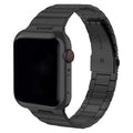 Stainless steel metal watch band for iWatch 38mm to 49mm in silver finish on table