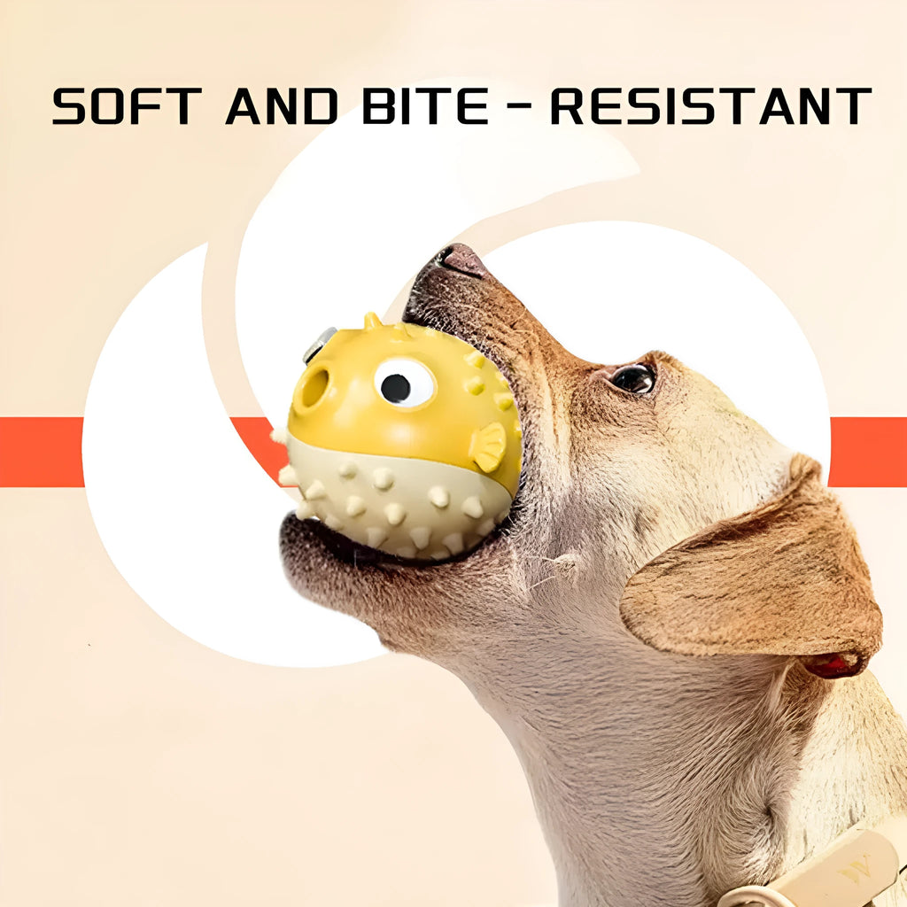 Yellow vinyl fish-shaped dog chew toy with textured surface for teeth cleaning.
