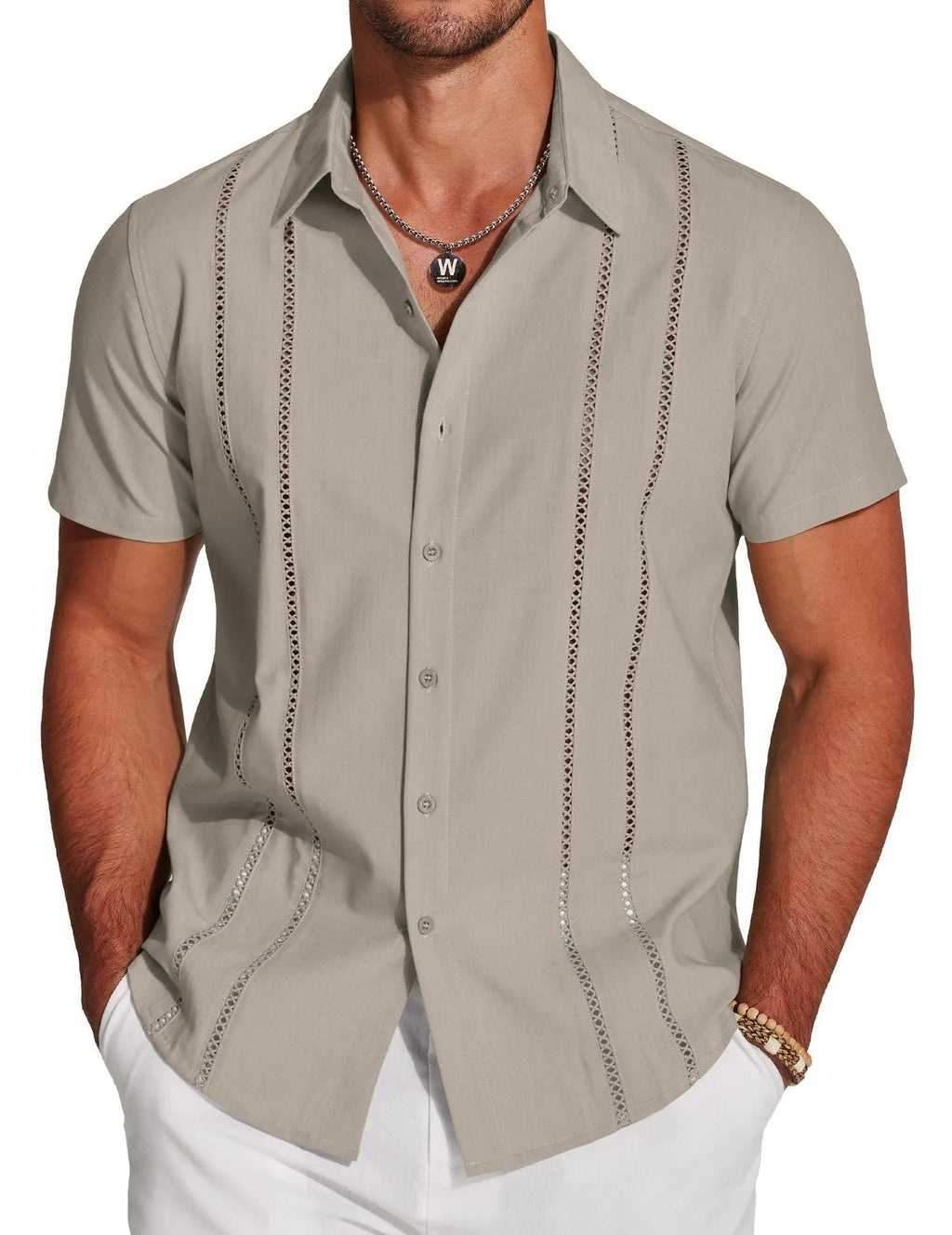 Man wearing a slim fit digital print Hawaiian short sleeve shirt in an elastic fabric