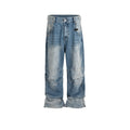Blue baggy straight-leg jeans with a zip fly, shown in a washed white blue colour.