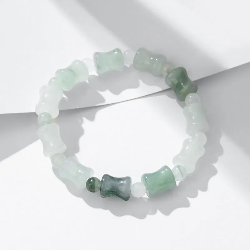 Natural chalcedony beaded bracelet with safety lock closure and diamond-shaped jade beads on elastic string