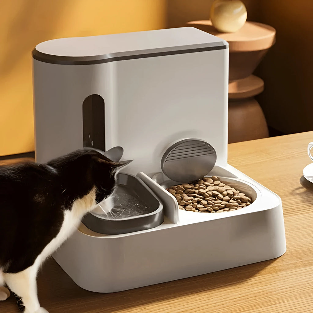 Grey automatic cat feeder with integrated water dispenser and stainless steel bowl