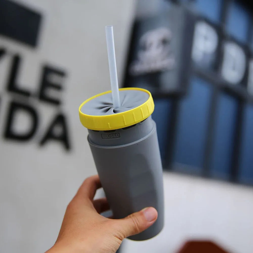 Double-walled insulated travel mug with twist-seal silicone membrane in cartoon design
