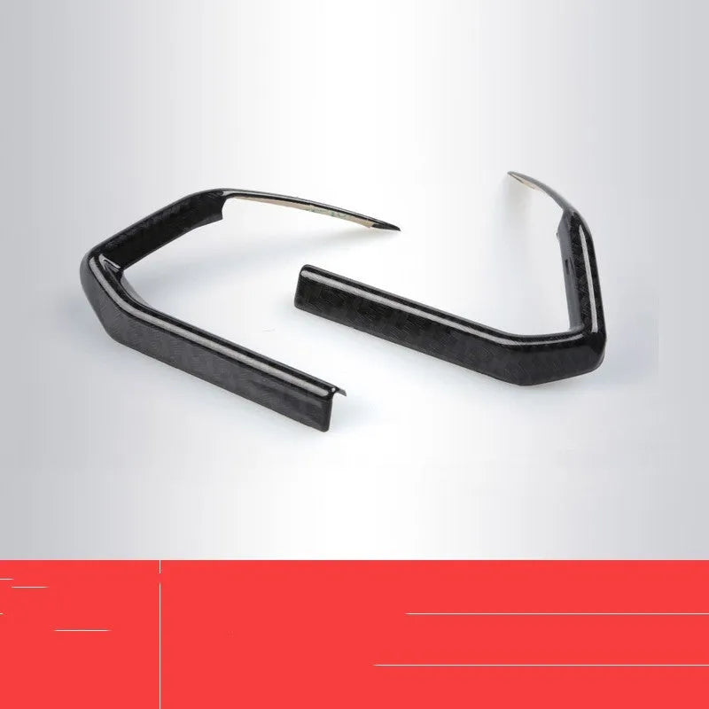 Pair of left and right ABS steering wheel frame trims with carbon fibre pattern for adhesive installation.