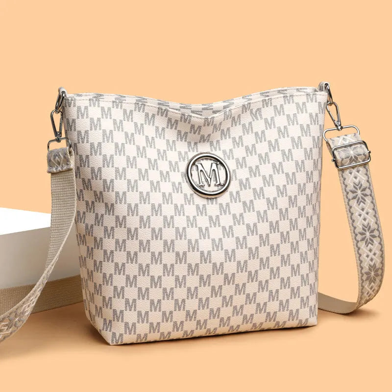 Retro dumpling-shaped women's shoulder bag in PU leather with zipper compartments