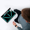 Black football training mat measuring 60cm by 90cm with non-slip surface