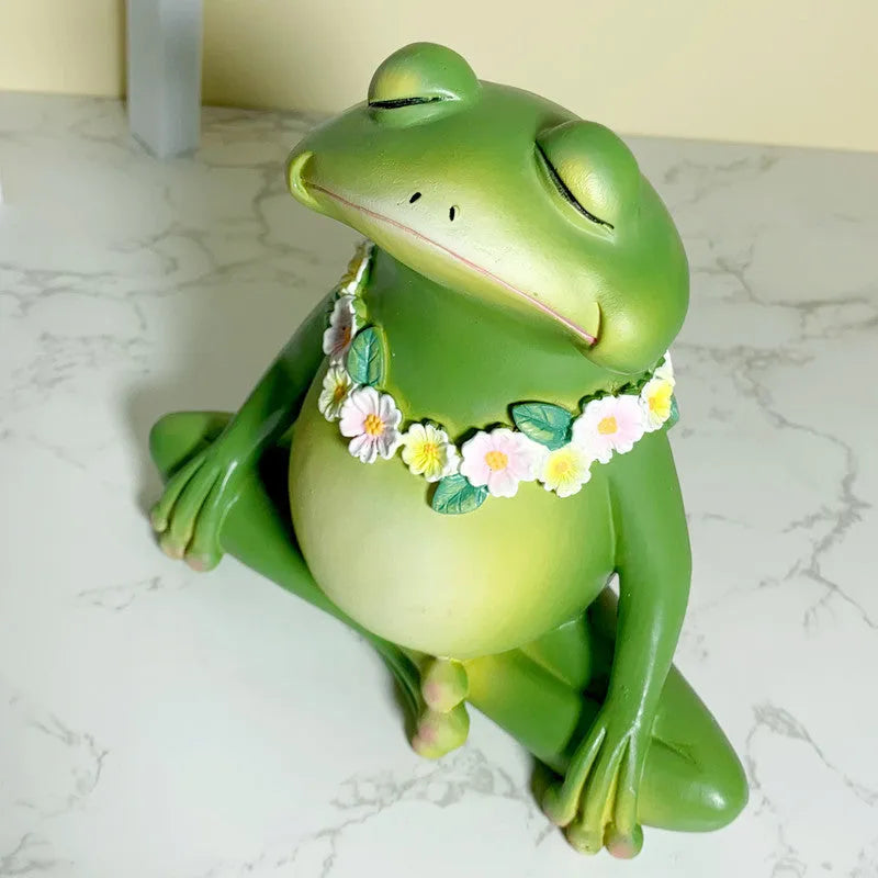 European style Magic Yoga Frog ornament in RDW123 colour on a shelf.