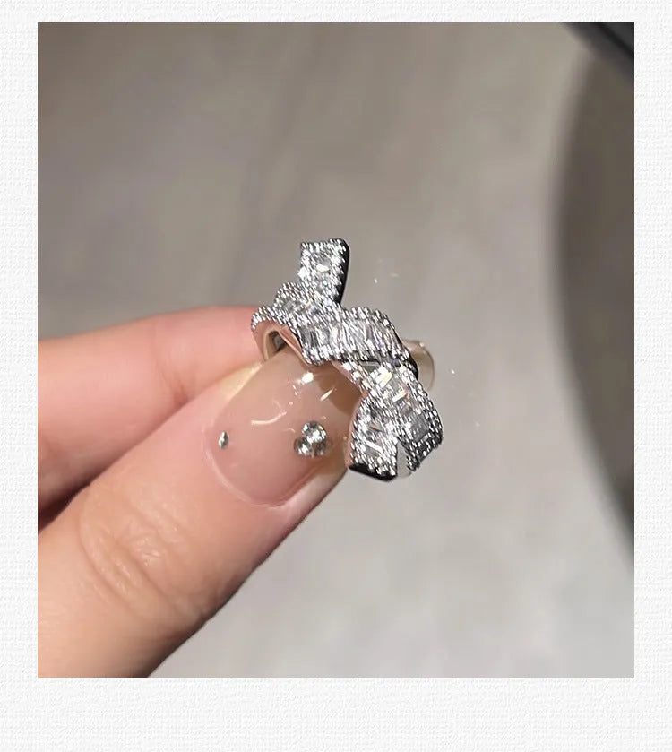 Silver cross open ring with bow shape on copper base, electroplating finish, minimalist style