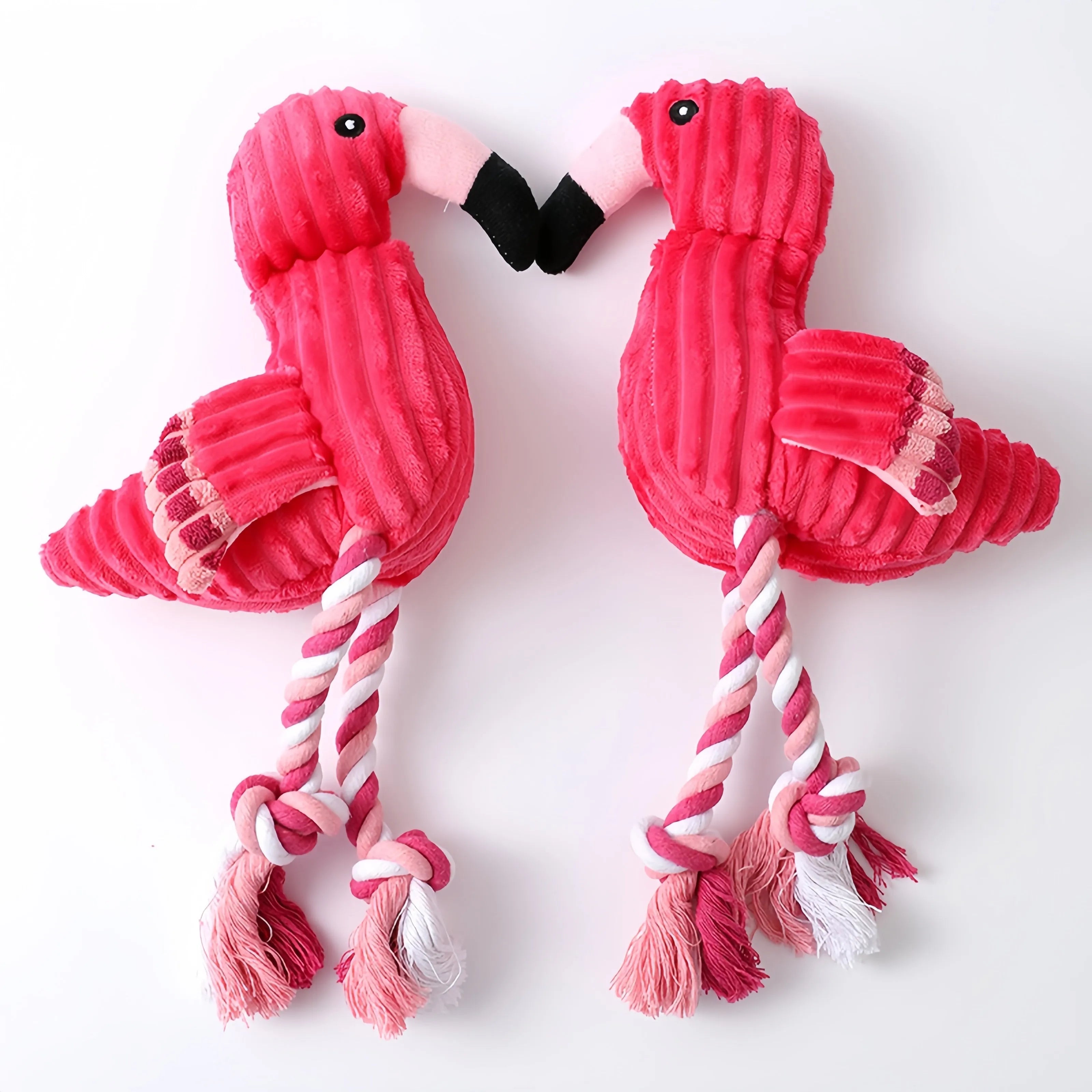Pink animal-shaped corduroy plush dog toy with squeaker