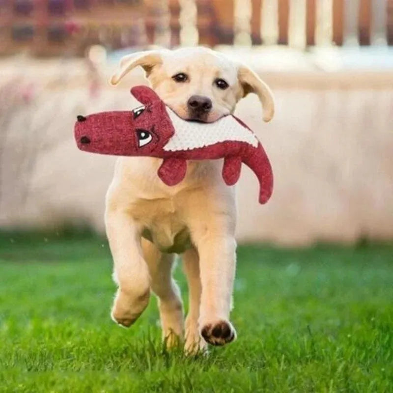Blue, green, and red corn-shaped plush pet toys with a grid texture on a white background