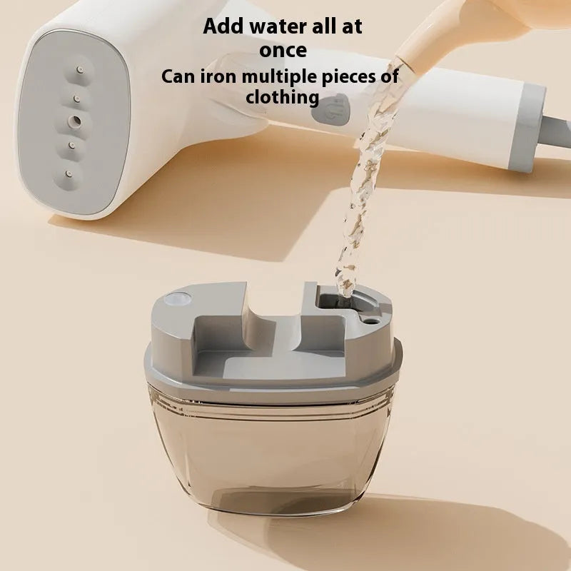 Blue handheld garment steamer with water tank and temperature control dial