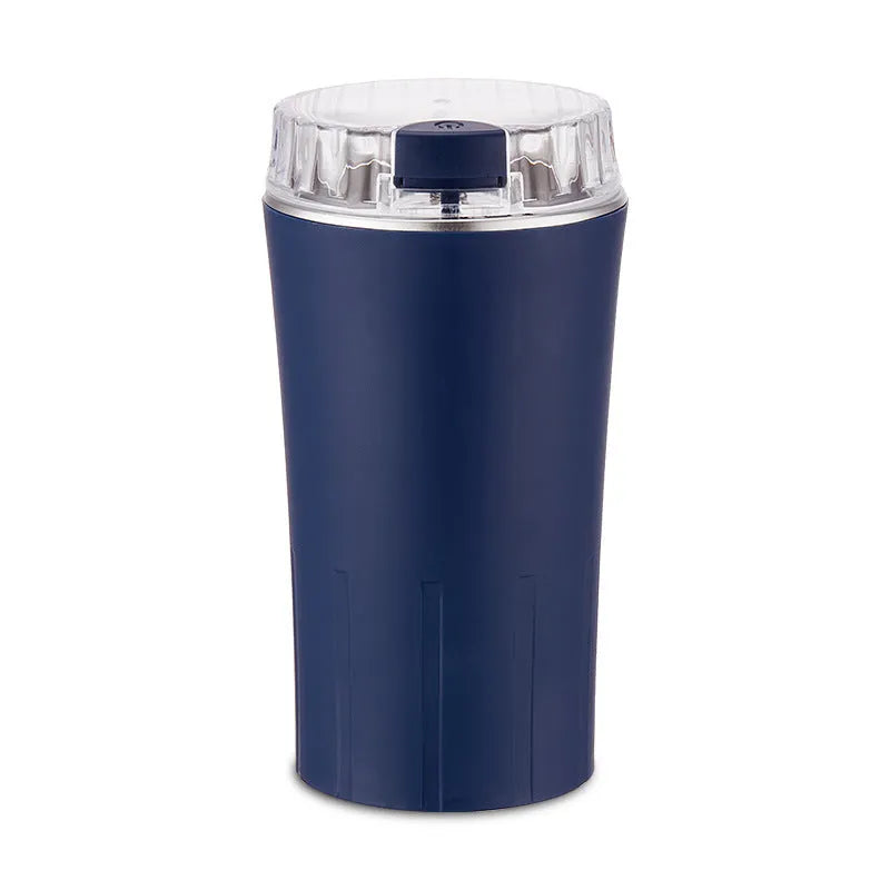 Blue mini flour mill and grinder machine with adjustable settings for making spice and grain powders.