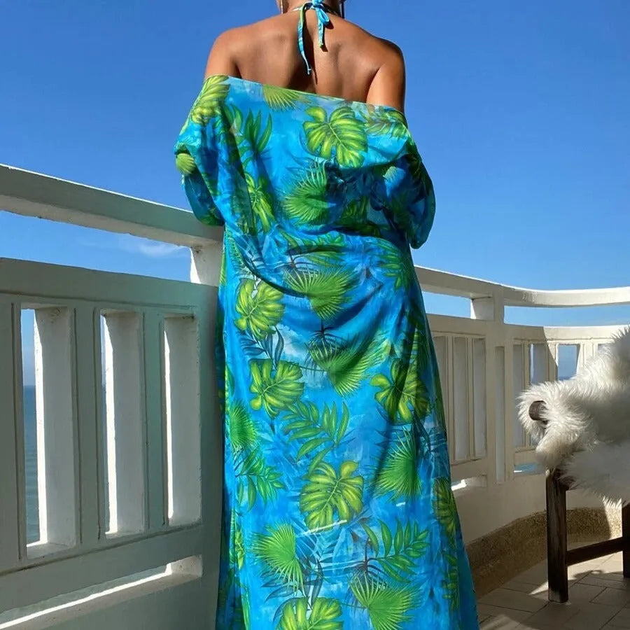 Blue long sleeve bikini set with banded briefs and a matching outer robe laid flat