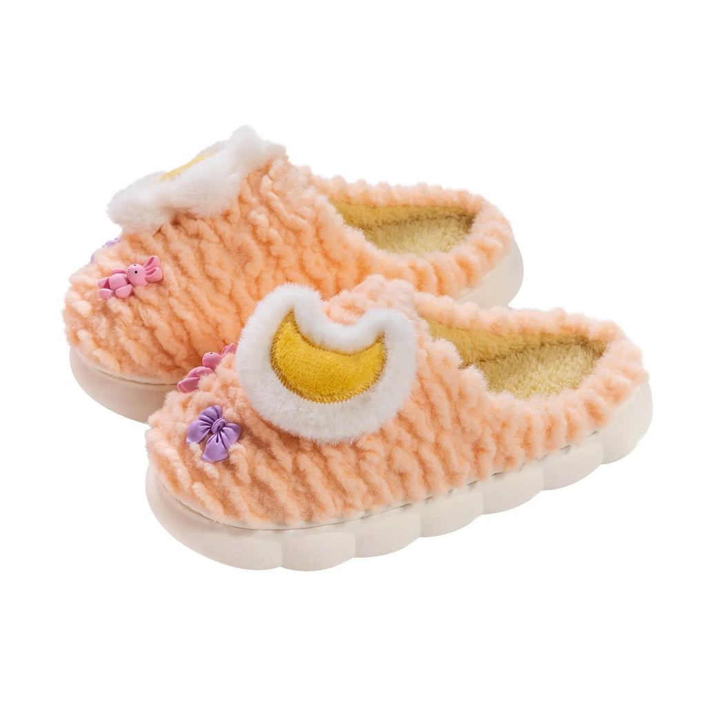 Women's light blue fleece-lined plush home slippers with round heel and PVC sole.