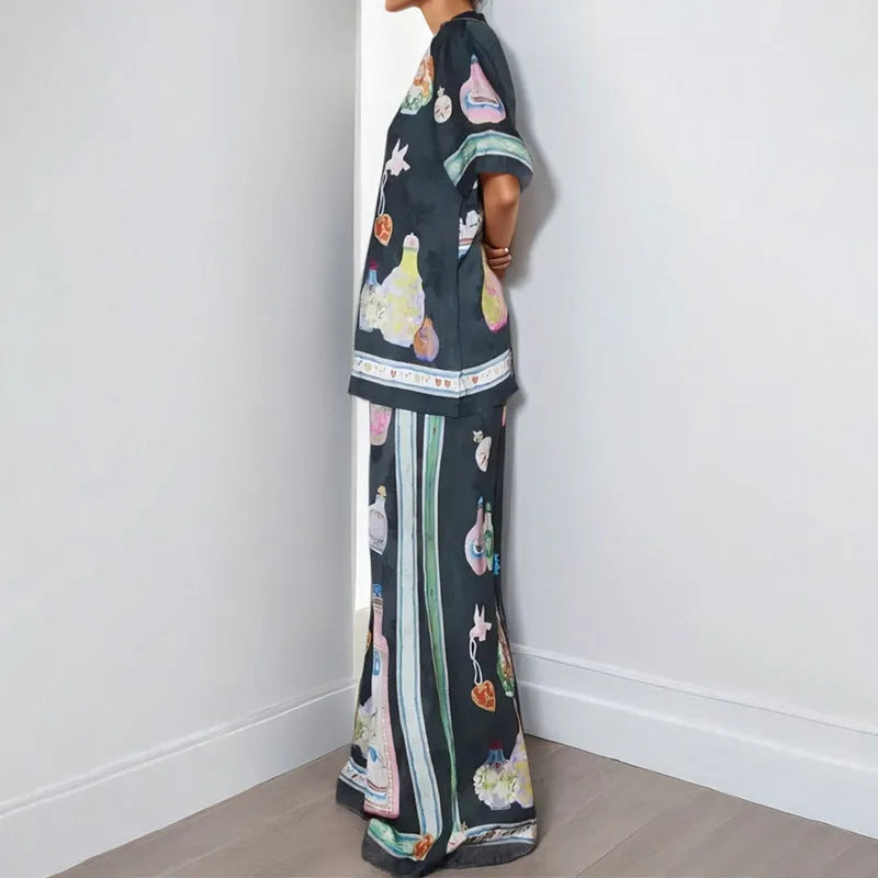 Black women's casual set with cartoon pattern cardigan and matching trousers