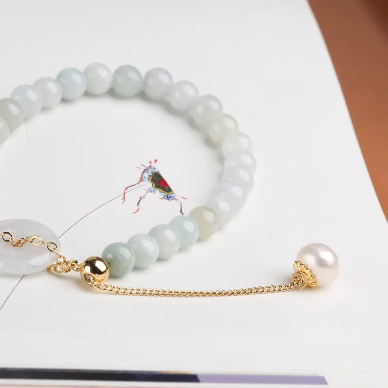 Handcrafted jade pearl bracelet with peace buckle closure in traditional Chinese style