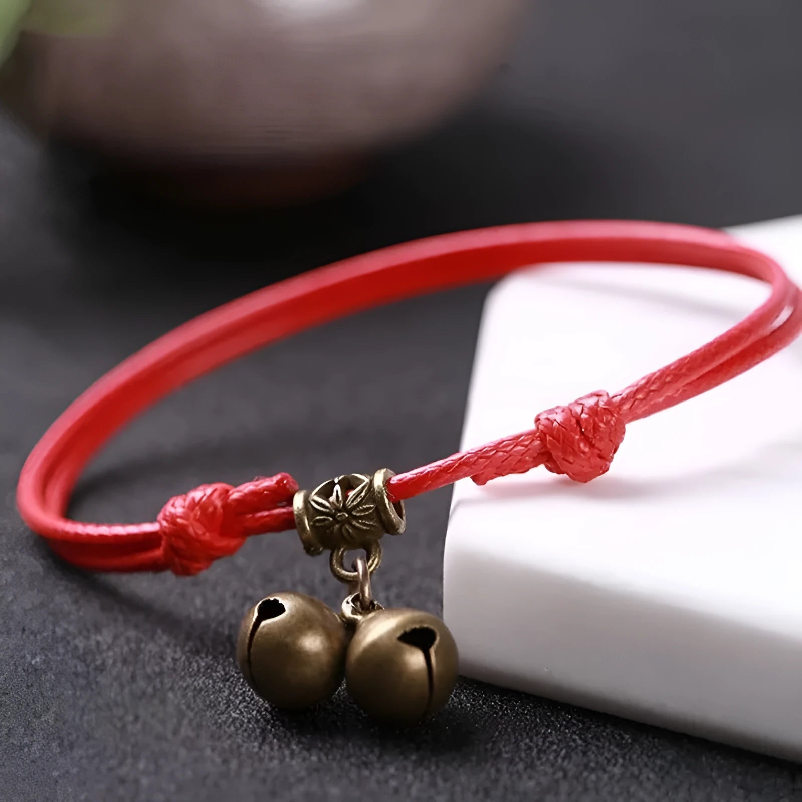 Adjustable nylon dog collar with brass bell or buckle in black, red, or coffee rope colour.