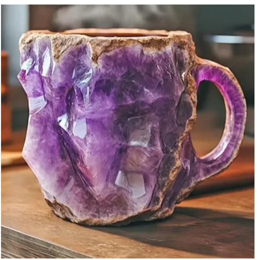 400ml resin mineral crystal coffee mug with handle, 10cm high, purple colour, on a table