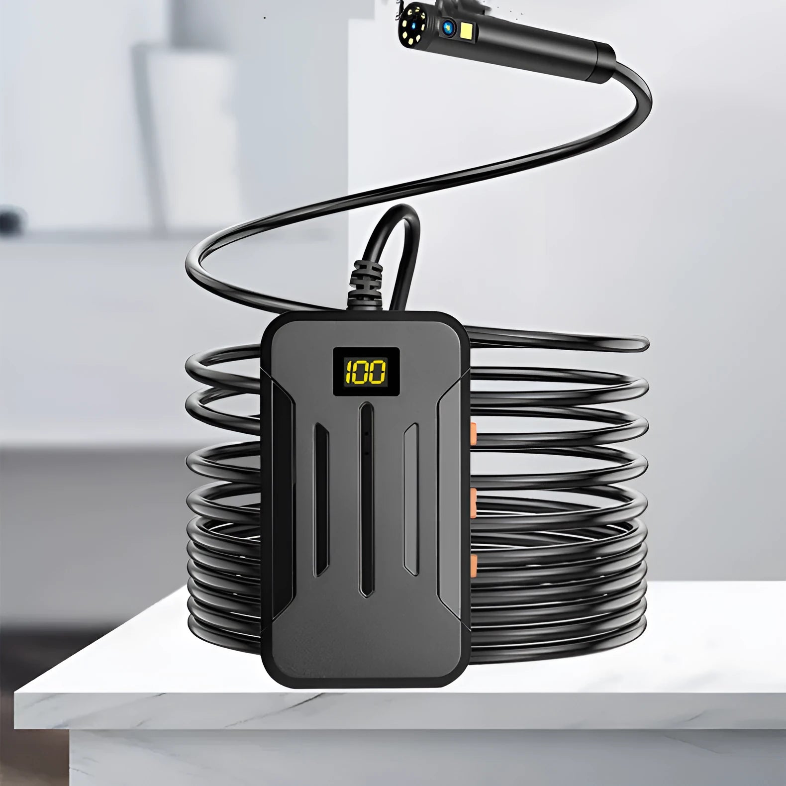 F300 wireless endoscope with dual 5.5mm and 8mm camera probes, magnet, and hook accessories on a dark background