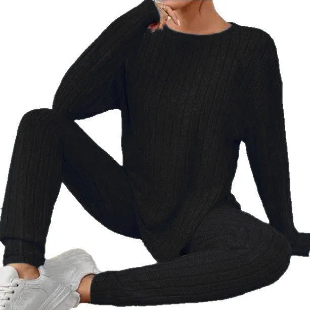 Women's black sunken stripe polyester two-piece homewear set with short-sleeve top and trousers