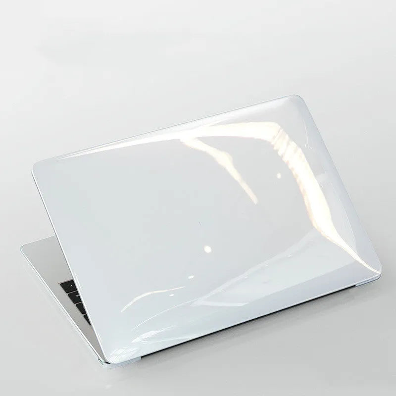 Black and transparent PC hard shell protective cases for Apple MacBook Pro 14-inch and 16-inch laptops.