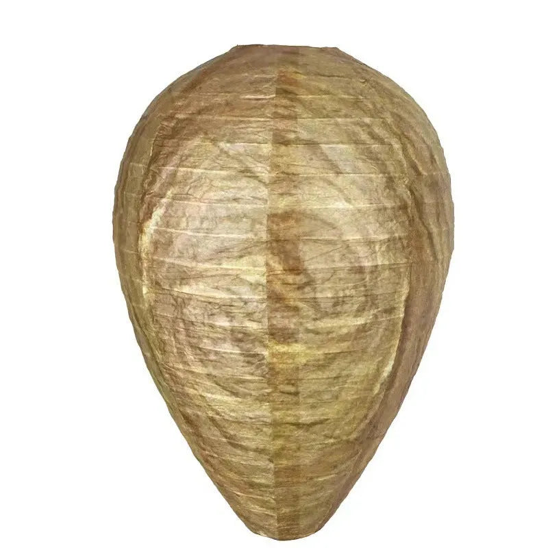 Oval flannel honeycomb lantern for wasp deterrence in a garden setting