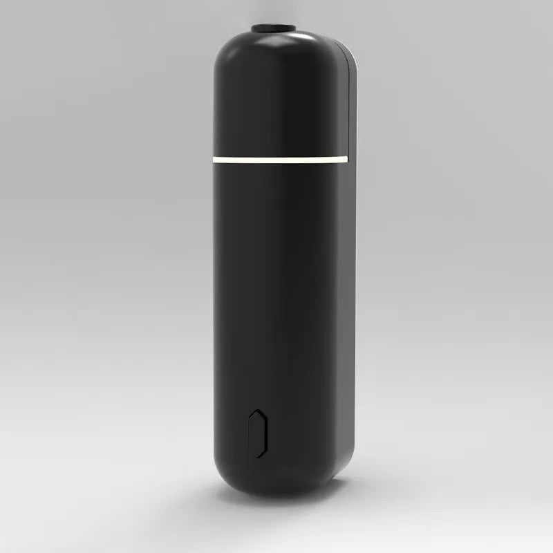 Automatic ultrasonic aroma diffuser in black, wall-mounted with single mist outlet, battery powered, 0.5L capacity