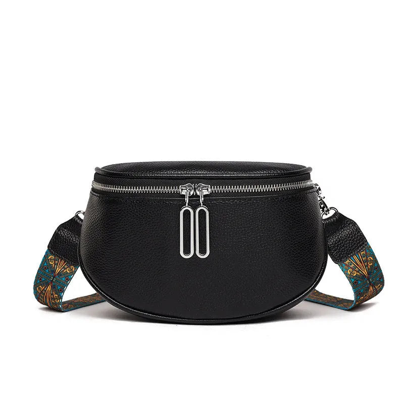 Women's saddle-shaped messenger bag in soft PU leather with cross-body strap and zippered compartment