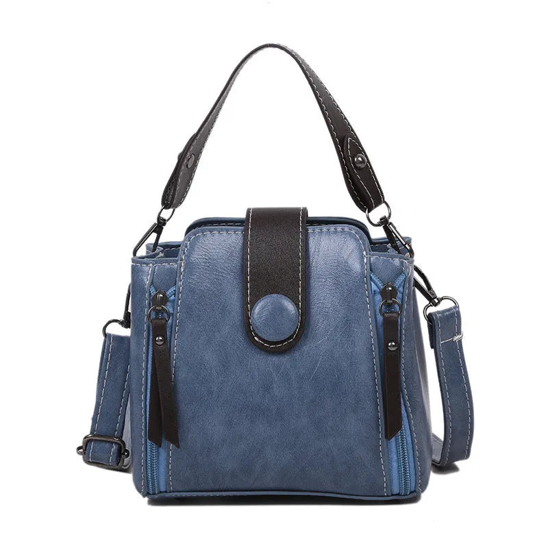 PU shoulder crossbody bag in white, blue or black with adjustable strap and retro street style