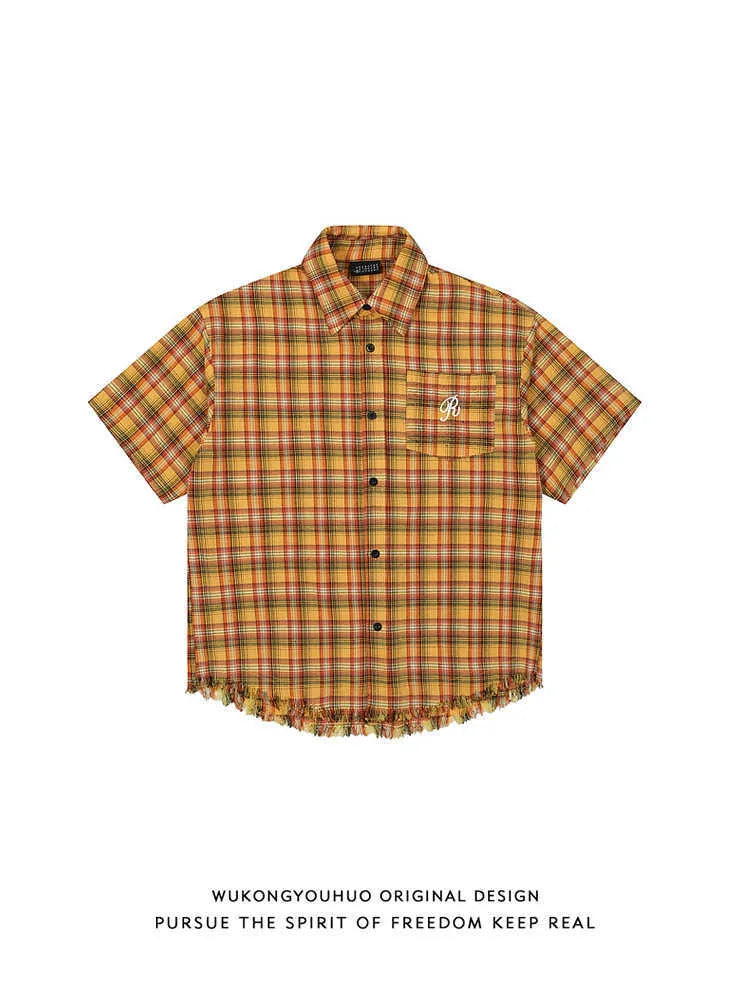 Yellow plaid short sleeve shirt with embroidered pocket detail in loose fit style