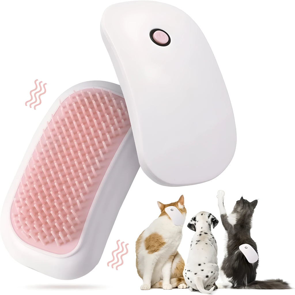 Pink handheld electric pet grooming brush with soft TPE teeth for cats and dogs.