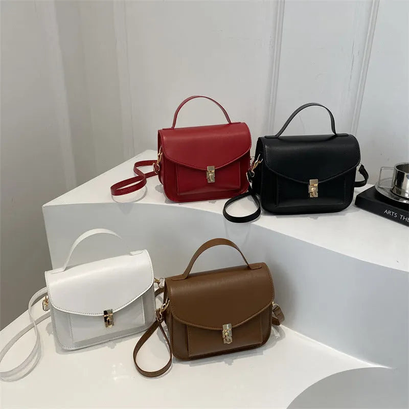 Retro-style horizontal square messenger bag in PU leather with crossbody strap and sandwich pocket