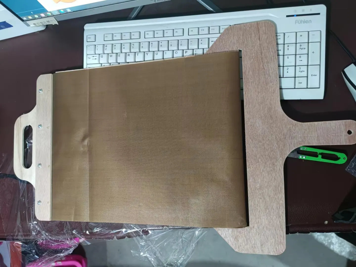 Wooden pizza transfer shovel with cutting board surface and hanging hole