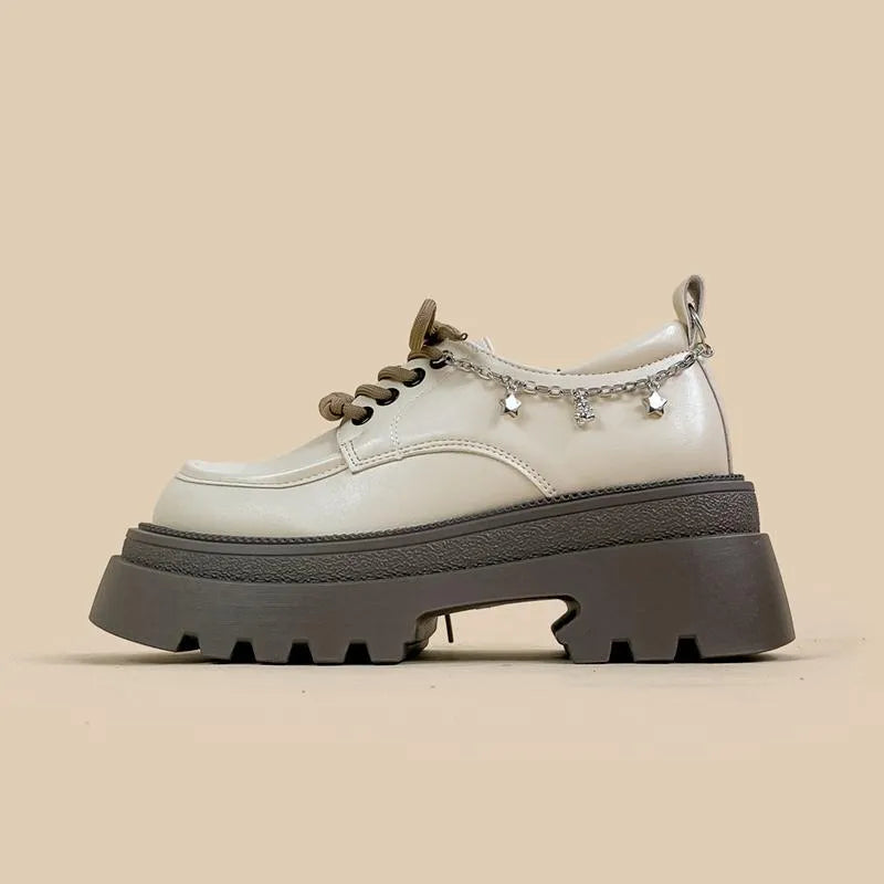 White women's platform Mary Jane shoes with round toe, front lace-up, and a chunky heel