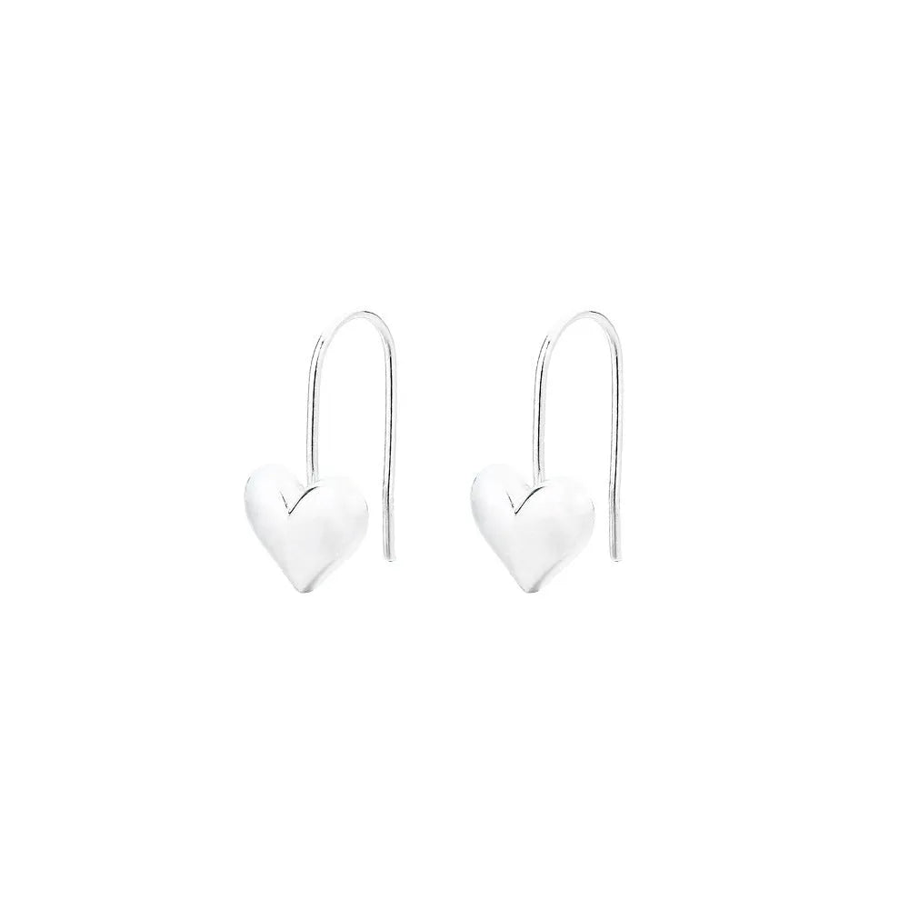 Silver coloured heart-shaped earrings with three-dimensional design and ear hooks