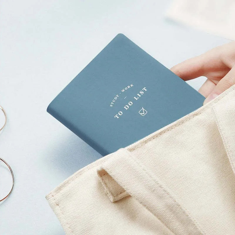 Portable todo list notebook with soft PU cover in four colour options showing compact 98x178mm size
