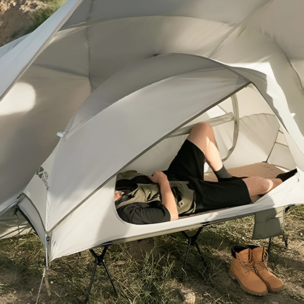 White ultra-light folding single camping tent, 195 x 65 x 88 cm unfolded, aluminium alloy poles, polyester rainproof shell