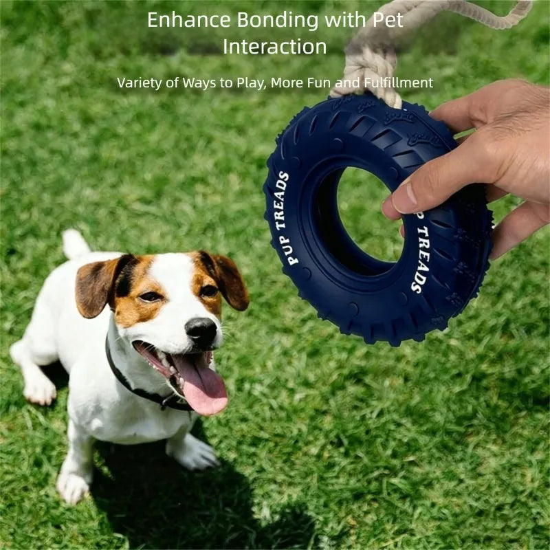Rubber tire dog chew toy with cotton rope handle for tug of war and treat dispensing, in black, blue, or orange