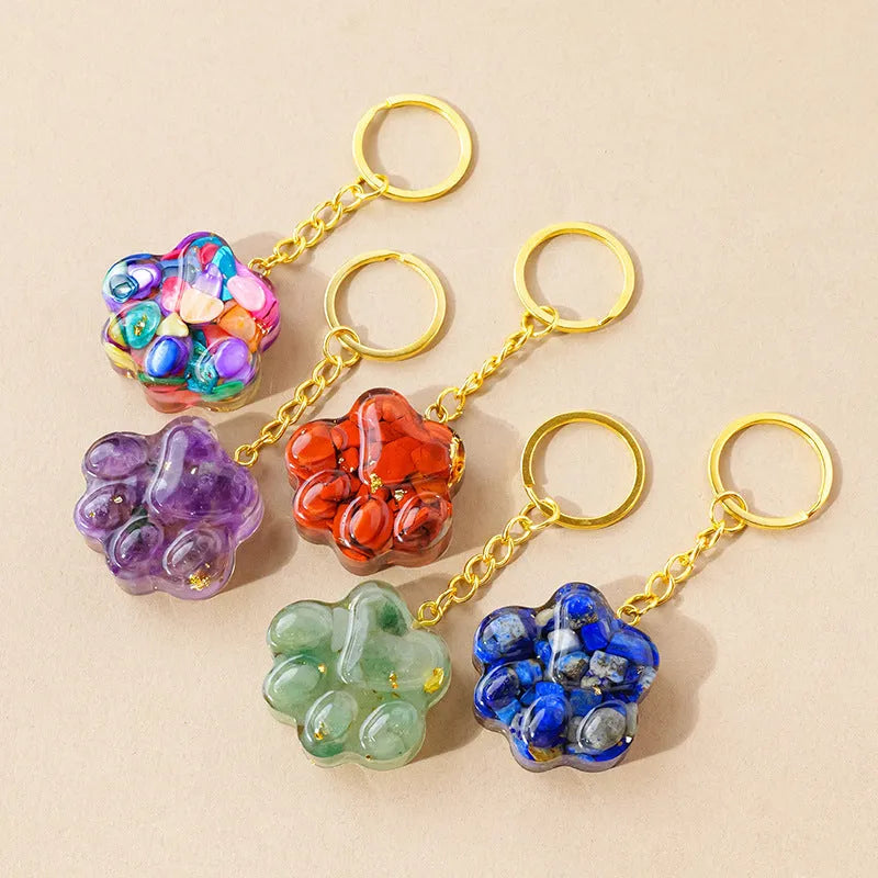 Natural crystal cat's paw keychain pendant in a chosen gemstone like turquoise or amethyst.
