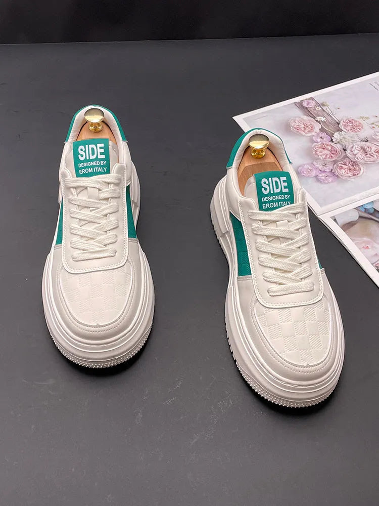 Unisex green and white sports casual shoes with cloth upper and rubber foam sole.