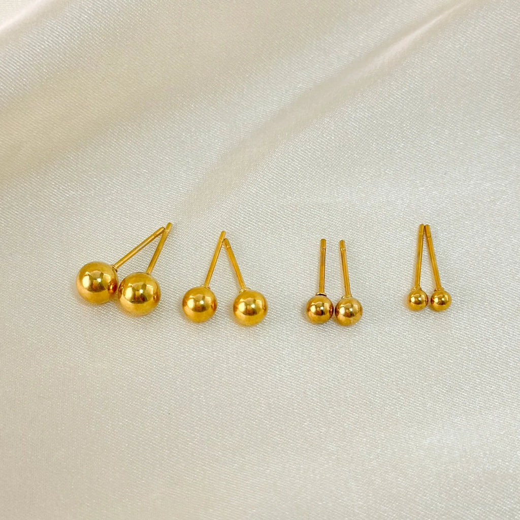 Titanium steel ball stud earrings with round geometric design in gold and silver electroplated finishes
