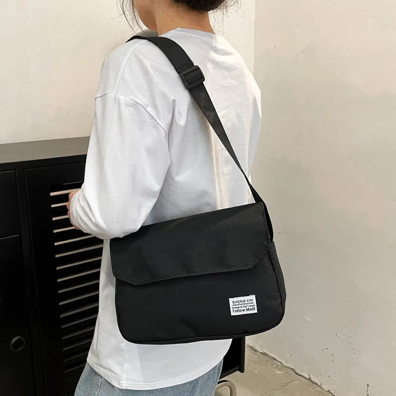 Oxford cloth crossbody messenger bag in solid colour for women and men with flap closure