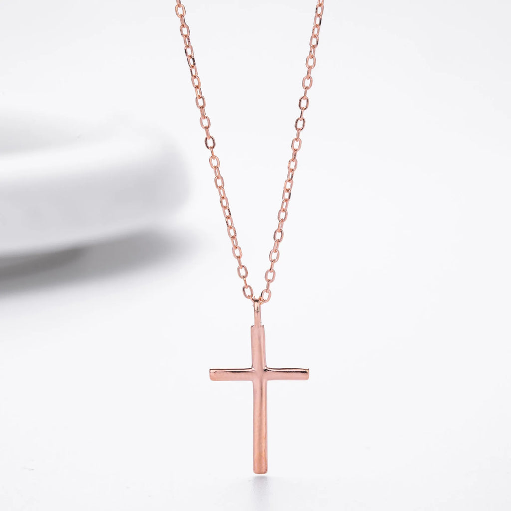S925 sterling silver necklace with glossy cross pendant on O-chain in gold, platinum, or rose gold plating.