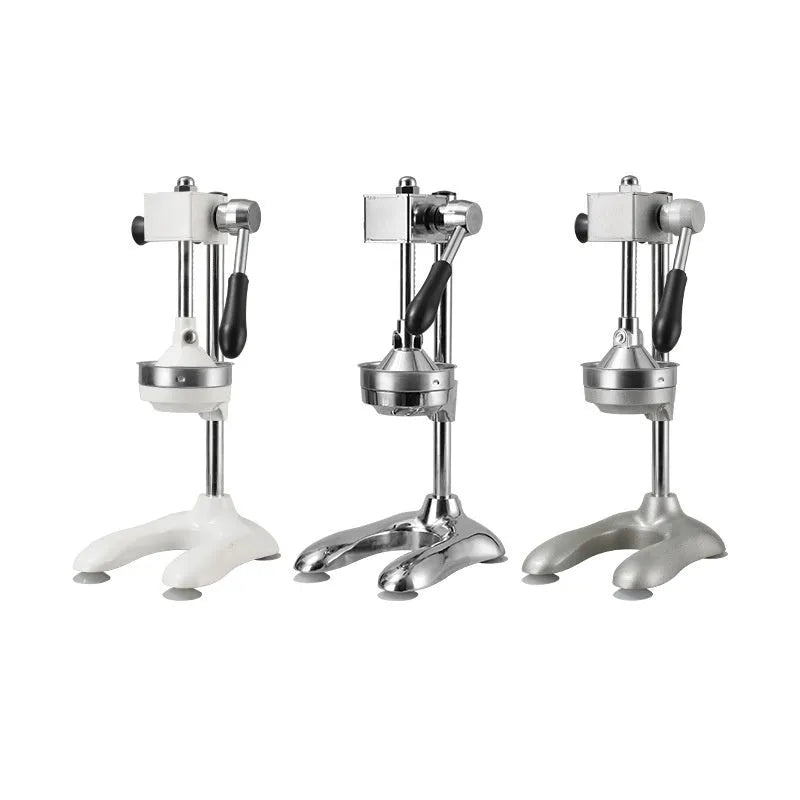 Vertical stainless steel manual citrus juicer in a choice of colours and head styles on a kitchen counter.